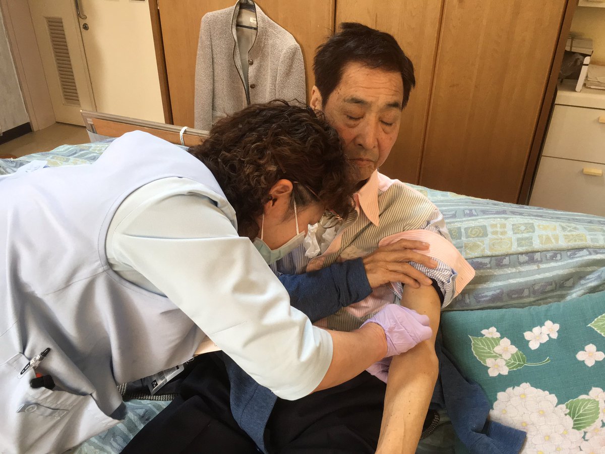 A nurse sticks medicated seals on Mr. Hata's arm. They contain powerful narcotic & can't be touched with bare hands. https://t.co/n0n0K56EQP